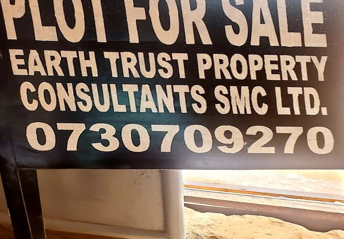 Land with an Earth Trust plot-for-sale sign